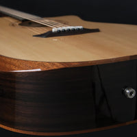 Angled close up view of Washburn G20SCE Comfort 20 Grand Auditorium Acoustic Guitar (Natural) on studio