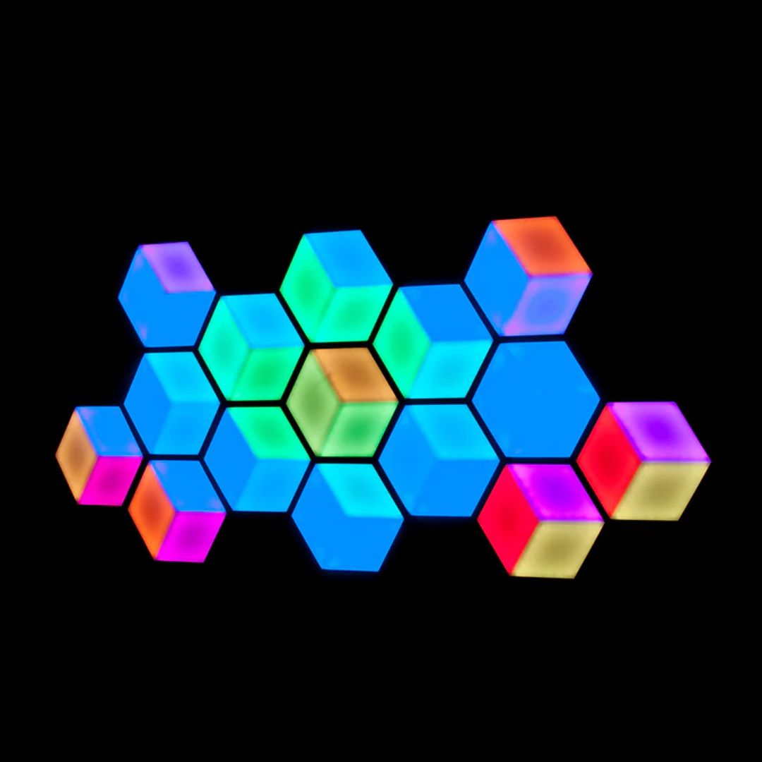 Front view of multiple ADJ 3D Vision Plus Hexagonal LED Panels with various colors on black background