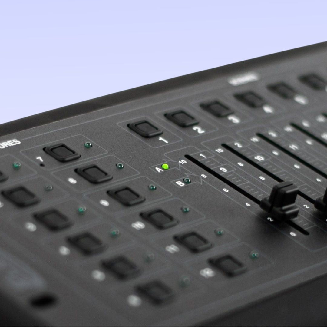 Close up view of ADJ DMX Operator Lighting Controller on lilac background