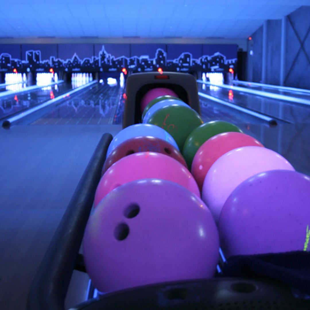 Bowling alley with strips of ADJ ECO UV Bar Plus IR