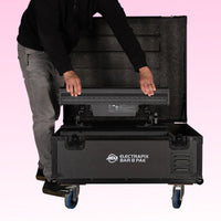Front view of ADJ ELE188 ElectraPix Bar 8 Pak case with light bar being put inside on pink background