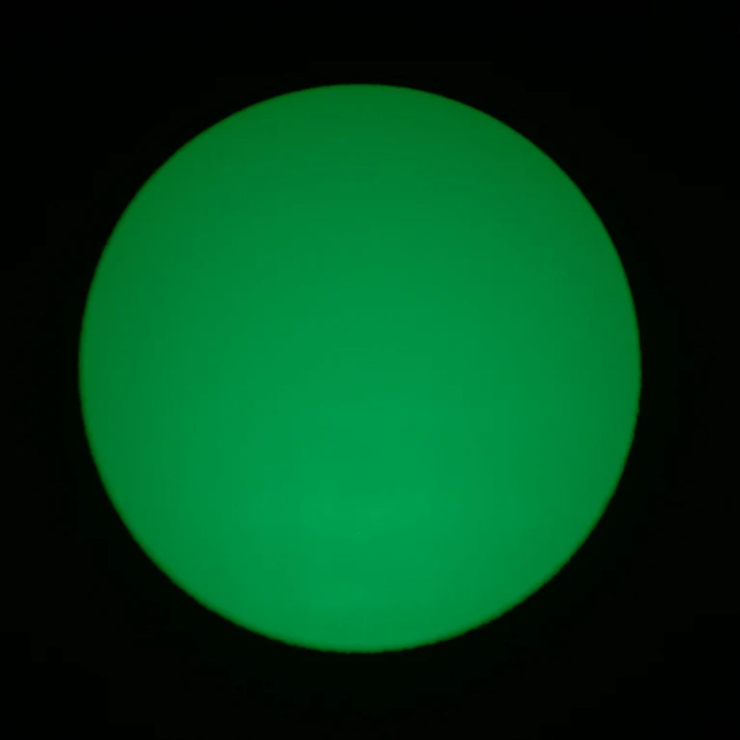 Green light through ADJ EP MINI LENS 15-30Z on blue background