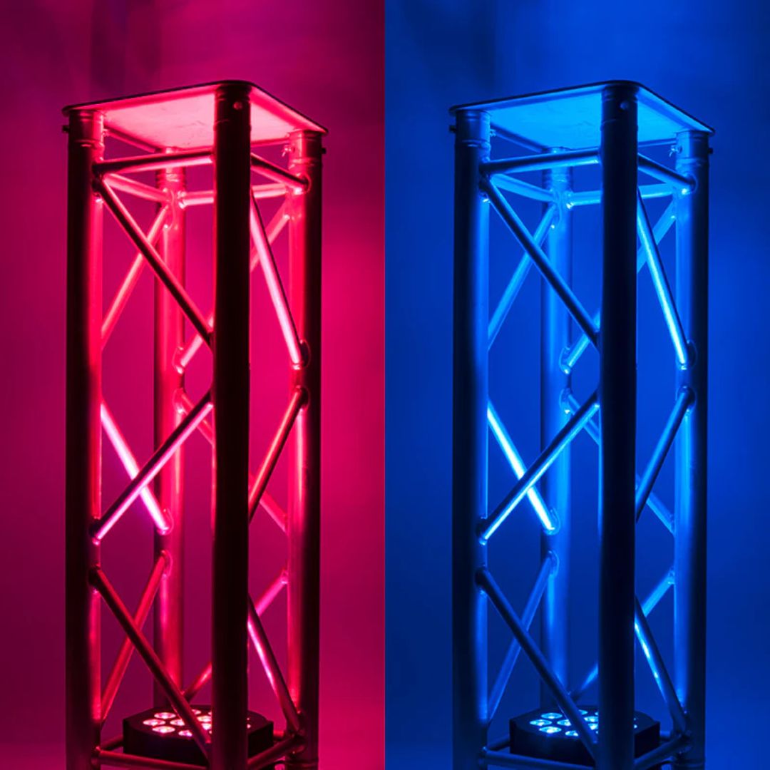 Two ADJ HEX410 12PX HEX RGBAW+UV LED Pars beaming blue and red lights inside metal fixtures
