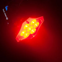 Hanging ADJ MOD STQ RGBW LED Wash Fixture beaming red light at an angle downward