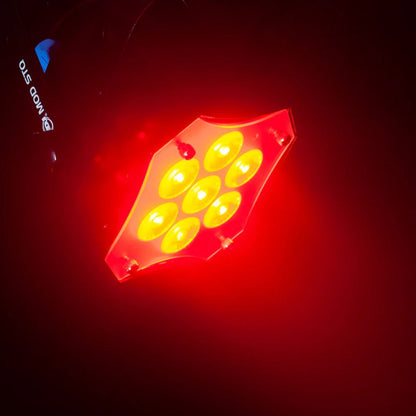 Hanging ADJ MOD STQ RGBW LED Wash Fixture beaming red light at an angle downward