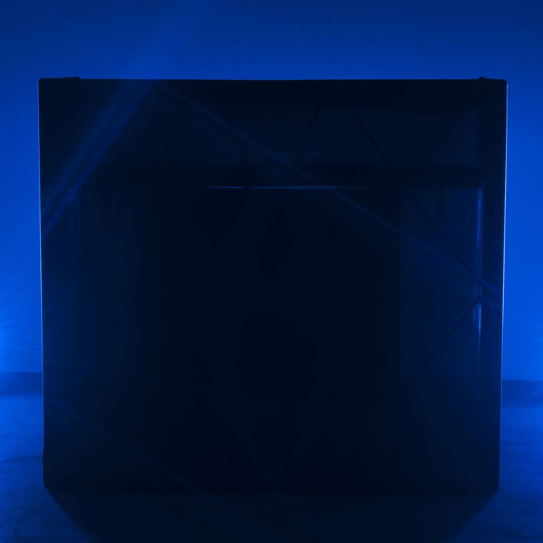 Front view of ADJ Pro Event Table Scrim Black in blue-lit studio