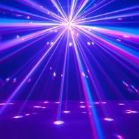 Hanging ADJ Starburst 6-Color LED Sphere beaming blue and pink lights in dim venue