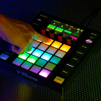 Angled front view of ADJ WMX1 Mk2 DMX Lighting Controller being played on textured surface