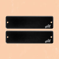 Front view of Aguilar DCB-D4 Dual Ceramic Bar 6-String Bar Bass Pickup Set on orange background
