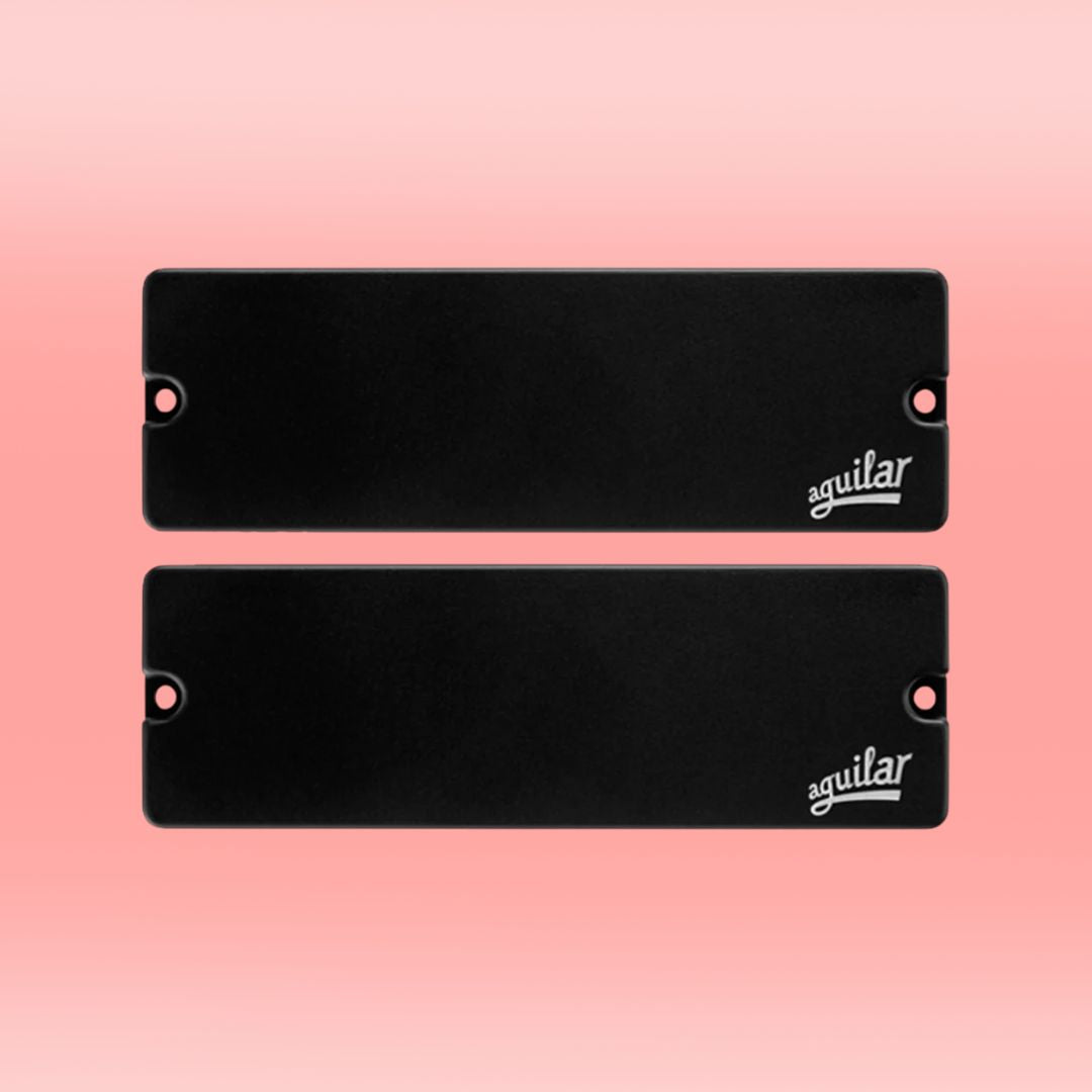 Front view of Aguilar DCB-G5 Dual Ceramic Bar 6-String Bar Bass Pickup Set on pink background