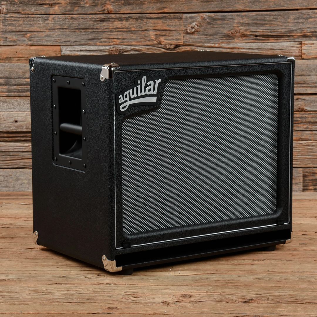 Angled front view of Aguilar SL 115 Bass Cabinet in wooden room