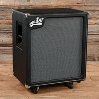 Angled front view of Aguilar SL 410x Bass Cabinet in wooden room