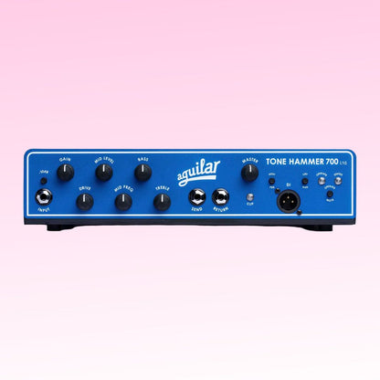 Front view of Aguilar Tone Hammer 700 Limited Edition Blue Bronco Bass Amp Head on pink background