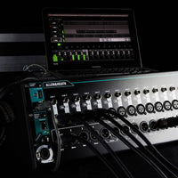 Angled close up view of Allen & Heath Qu-SB Rackmount Digital Mixer with iPad on top of it in studio