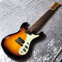 Angled view of Aria Pro II DM-206 Electric Guitar 3-Tone Sunburst on silver surface