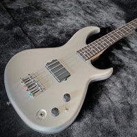 Angled close up view of Aria Pro II SB ONE Electric Bass Guitar Silver on velvet surface