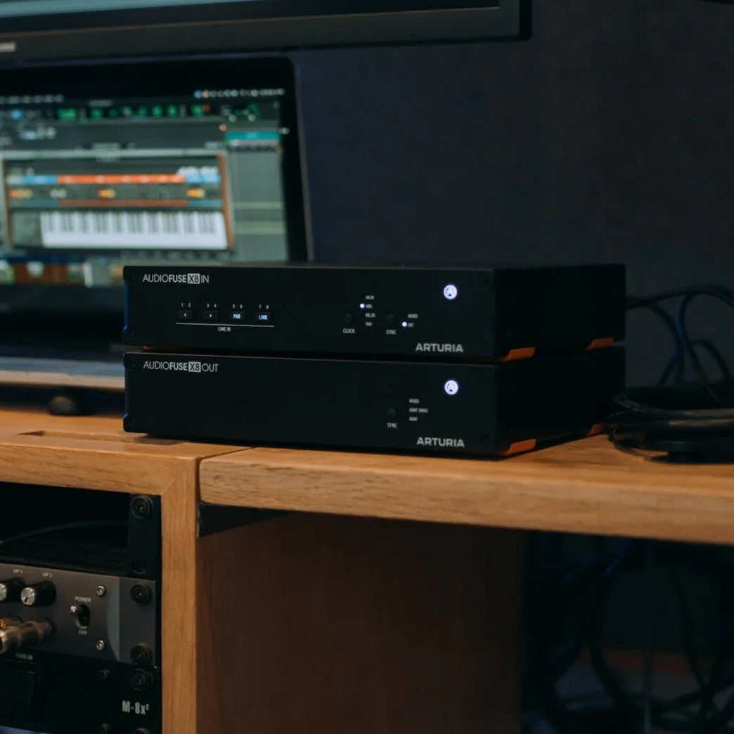 Stacked Arturia AudioFuse X8 IN and OUT ADAT Expanders on studio desk