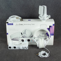 Inclusions of Arturia MiniFuse Recording Pack White on top of box on gray surface