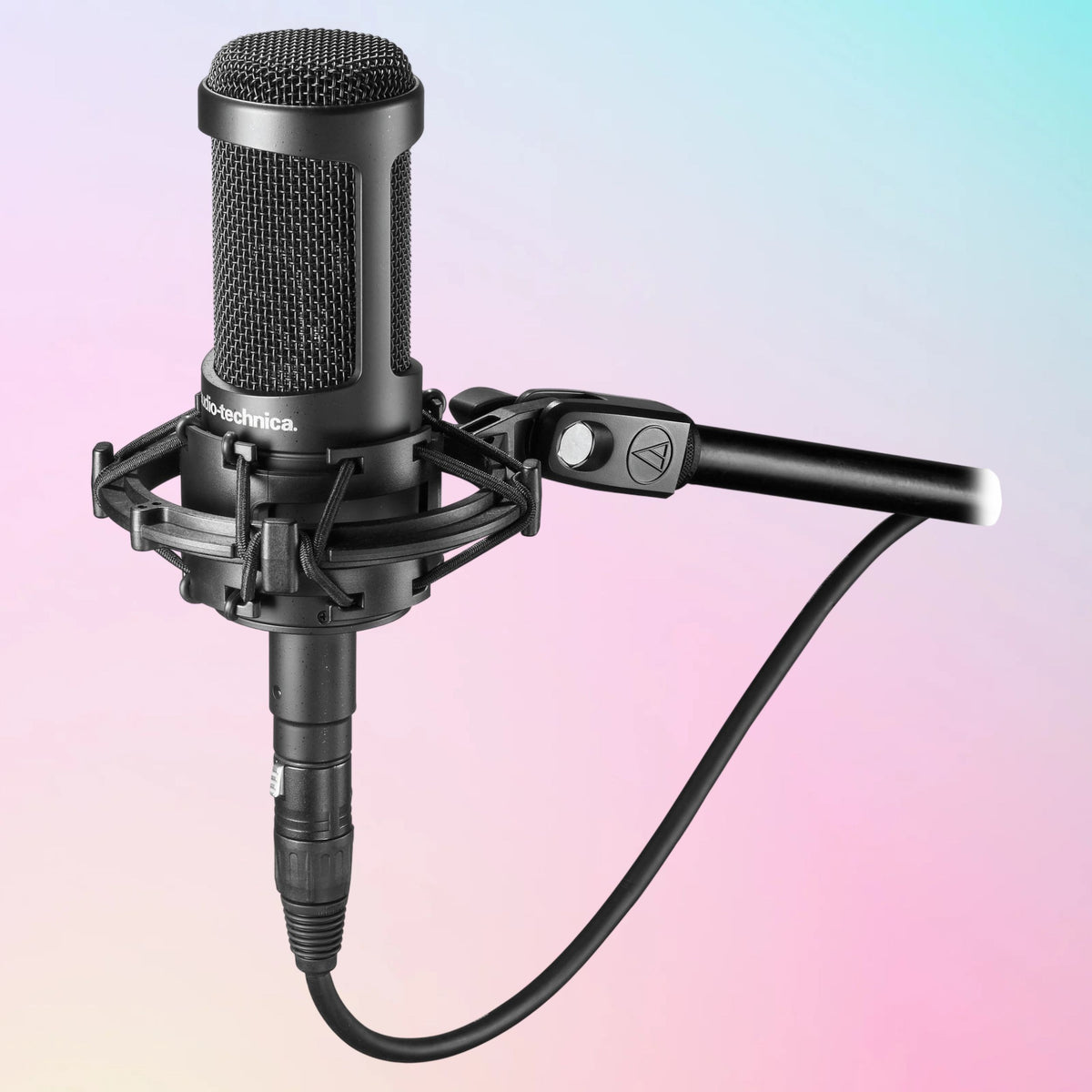 Mounted Audio-Technica AT2050 Multi-pattern Condenser Microphone on mic stand on pink and blue gradient background
