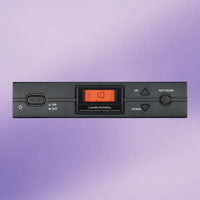 Front view of Audio-Technica ATW-R2100c Wireless Microphone Receiver on purple background