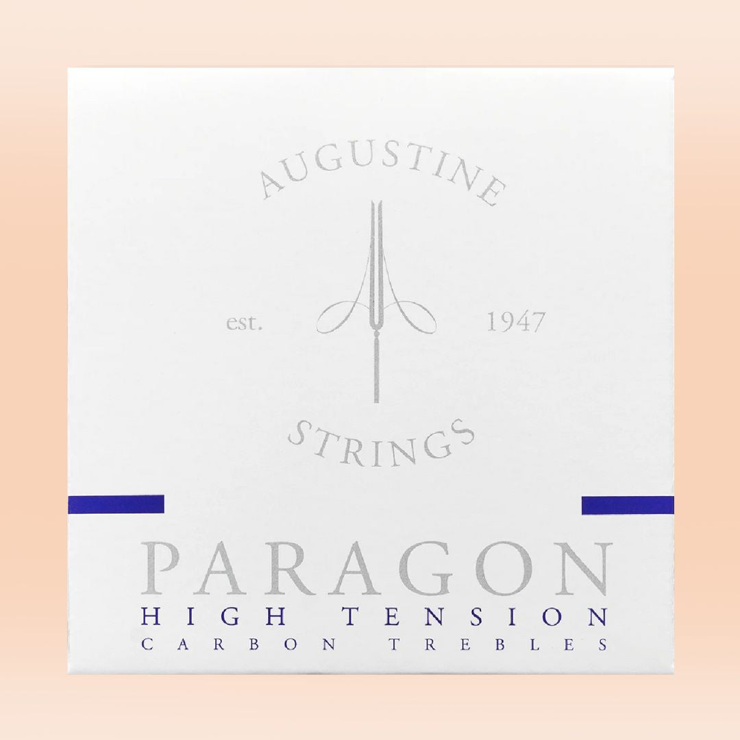 Augustine Strings Paragon High Tension Carbon Trebles packaging on a peach background