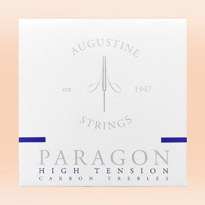 Augustine Strings Paragon High Tension Carbon Trebles packaging on a peach background