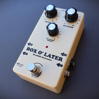 Angled front view of BLAMMO! Box o' Later Pedal on grey background
