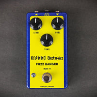 BLAMMO! Electronics Fuzz Banger Pedal On a Gray Surface