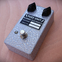 Angled view of BLAMMO! Electronics P2P Tone Bender MKii Pedal on wooden surface