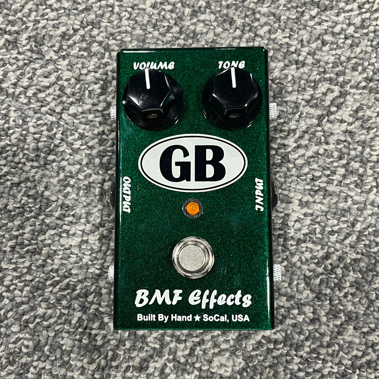 Front view of BMF Effects GB Boost Germanium Booster Pedal on gray carpet