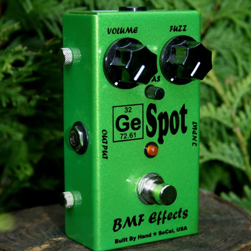 Angled view of BMF Effects Ge Spot Germanium Fuzz Pedal with leaves in background