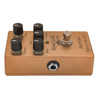 Side view of BearFoot FX Royal Gold OD pedal on white background