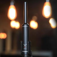 Front view of Beyerdynamic MM 1 Condenser Measurement Microphone mounted on mic stand in studio