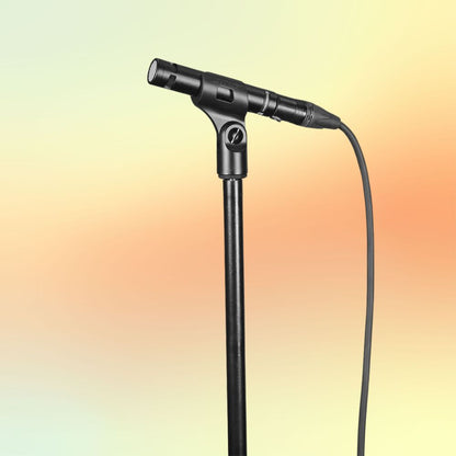 Beyerdynamic TG I53 Condenser Instrument Microphone on a mic stand on yellow and orange background