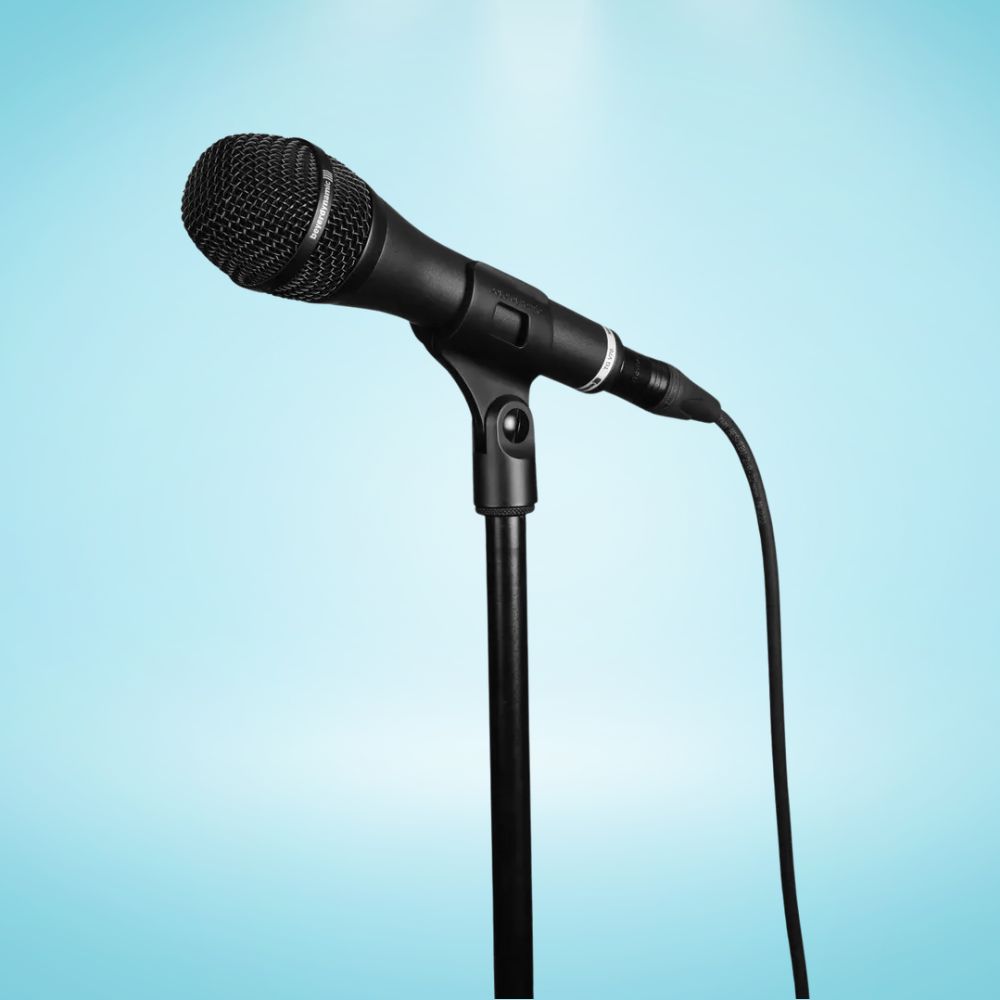 Beyerdynamic TG V70 Dynamic Vocal Microphone on mic stand with blue background