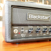 Close up view of Blackstar HT-1RH MK III Guitar Amp Head on wooden surface