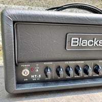 Close up view of Blackstar HT-5RH MK III Guitar Amp Head on concrete surface