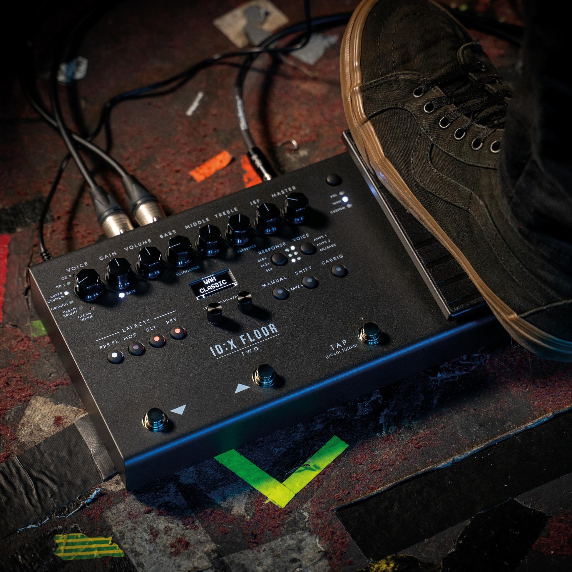 Foot stepping on the expression pedal of Blackstar ID:X Floor Two Multi-FX Pedal on floor