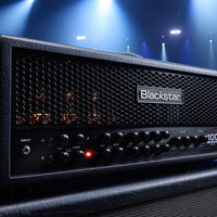 Angled close up view of Blackstar Series One 100 MK II Guitar Amp Head on speaker cab in venue