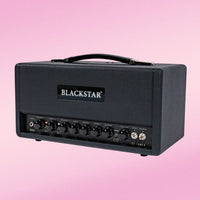 Angled view of Blackstar St. James 50 6L6 Guitar Amp Head on pink background