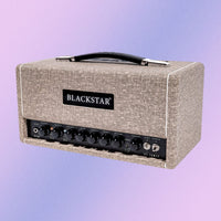 Angled view of Blackstar St. James 50 EL34 Guitar Amp Head on purple background