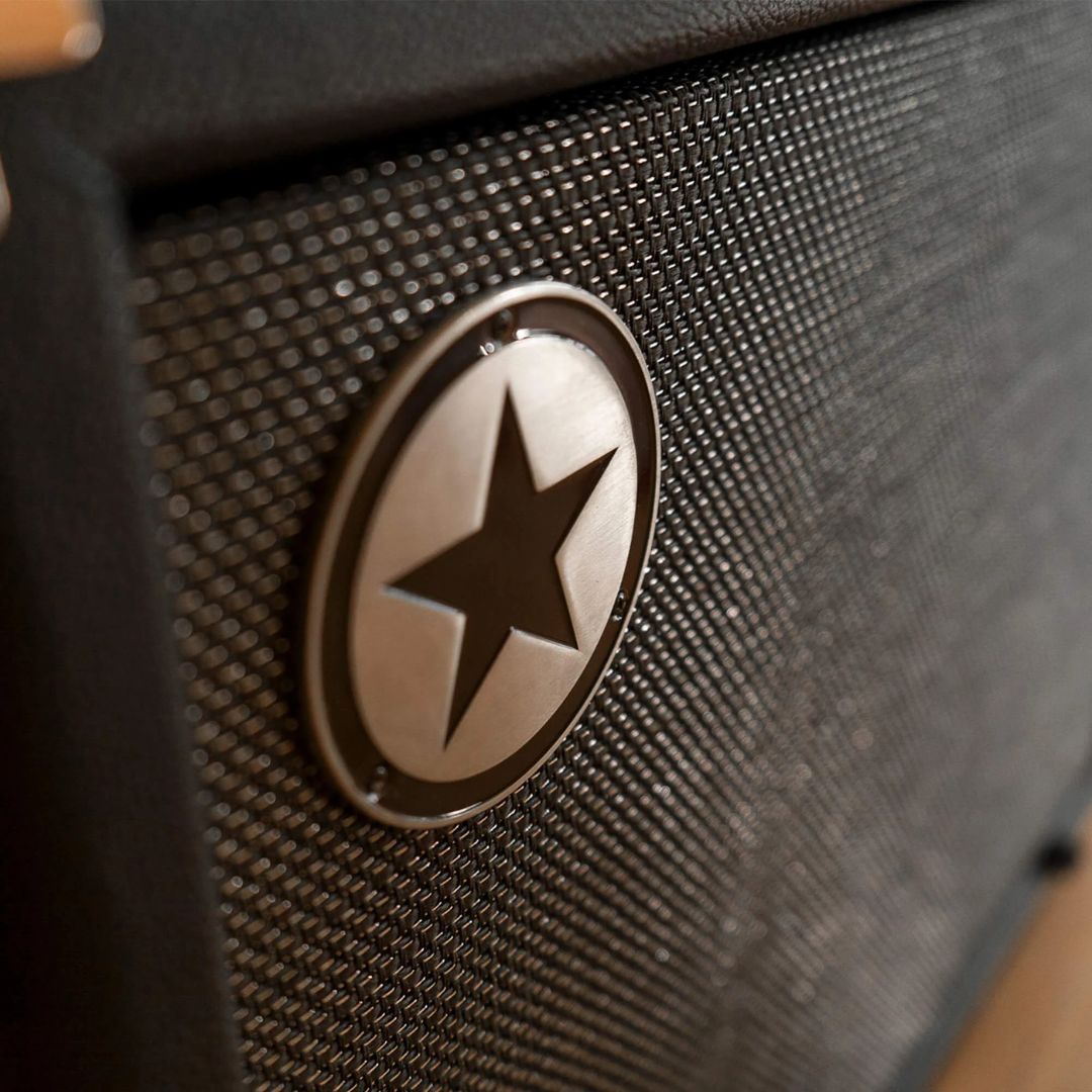 Close up view of Blackstar U210C Elite 400W Bass Cabinet's logo on front grille