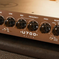 Close up view of Blackstar U700H Elite 700W Bass Head on top of speaker cab