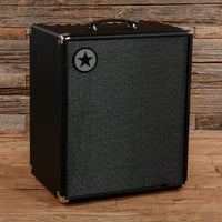 Angled view of Blackstar Unity 500 500W Bass Combo Amplifier on wooden floor with wooden backround