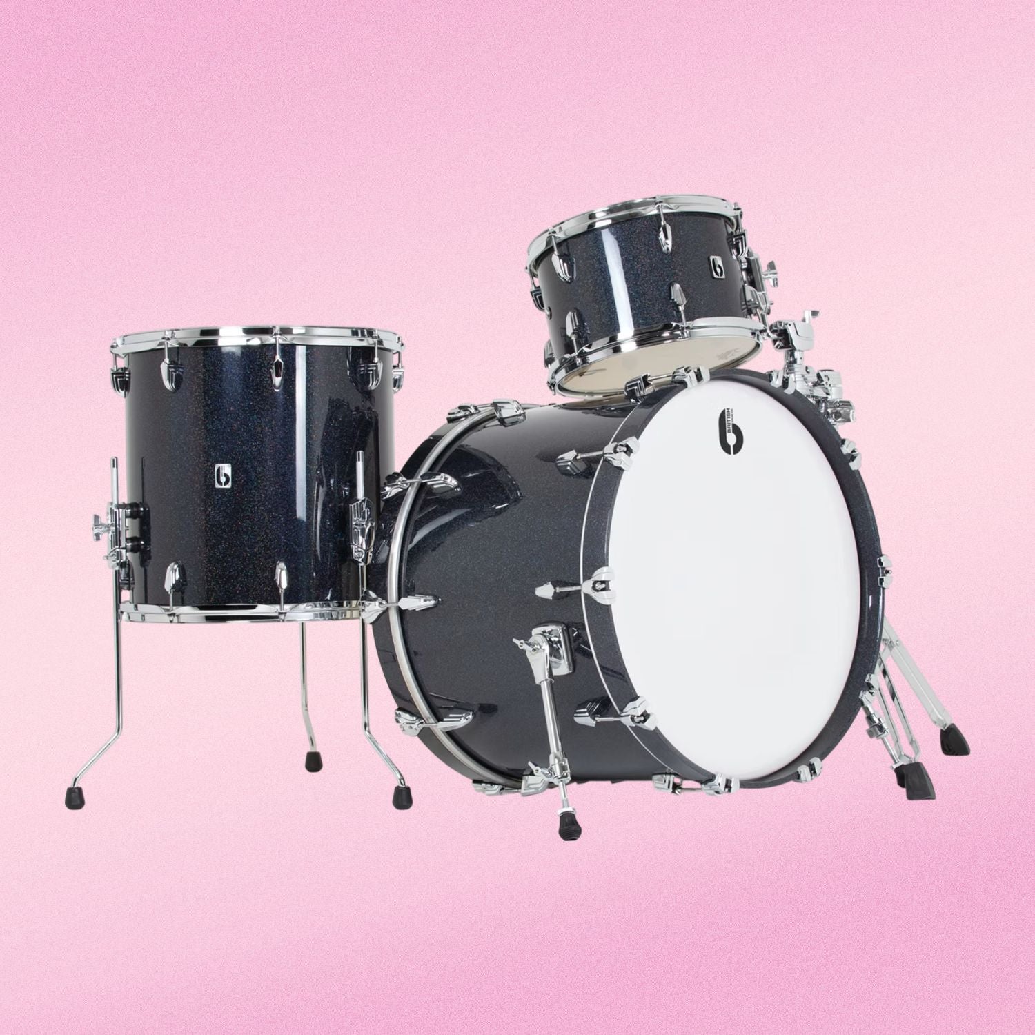 Angled view of British Drum Co. Legend Series 22" US Club Kit Ravenglass on pink background