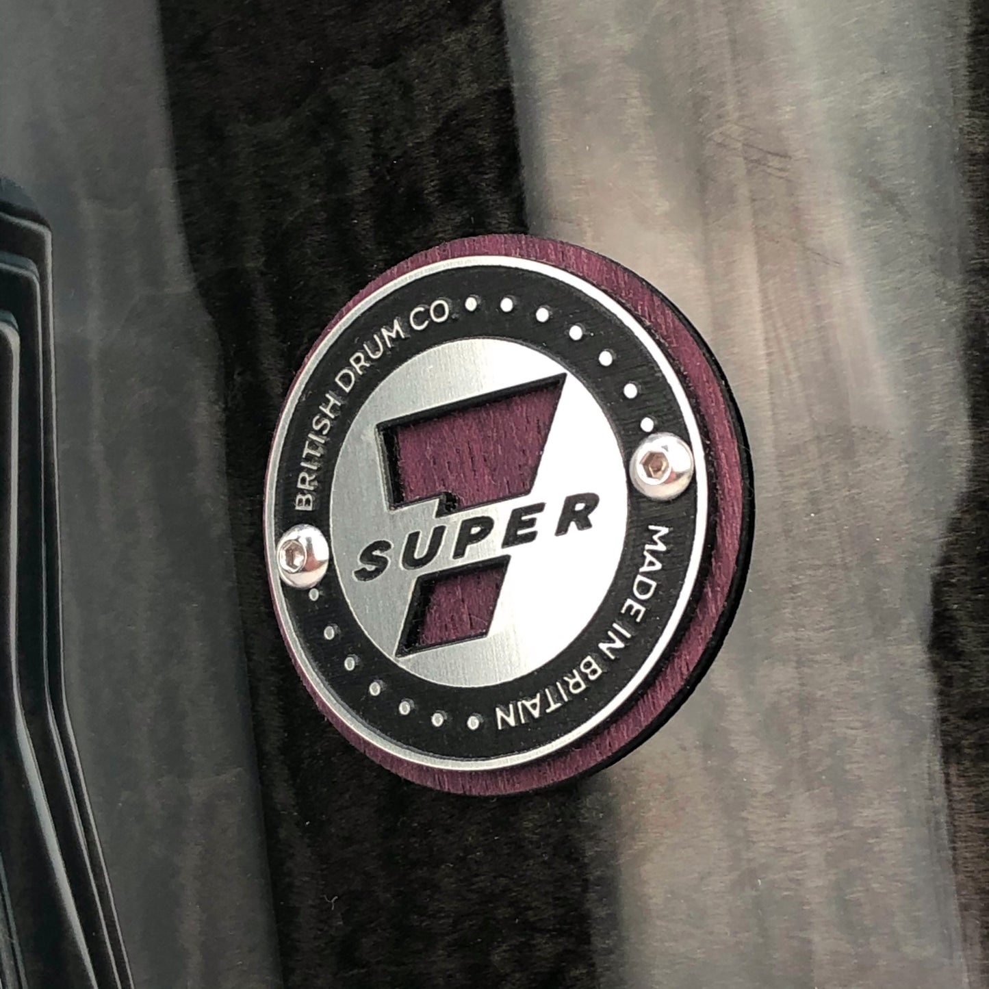 Close up view of British Drum Co. Super 7 Snare Drum badge