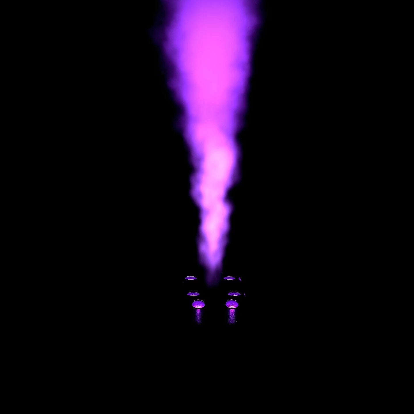 Chauvet DJ Geyser Move emitting purple light and fog upwards in dark venue