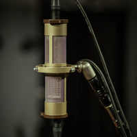 Coles 4050 Stereo on stand vertically with studio background