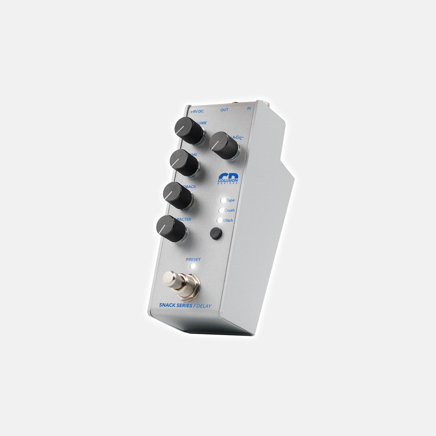 Angled view of Collision Devices Snack Delay Pedal on grey background
