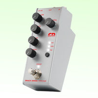 Angled view of Collision Devices Snack Pitch Pedal on green background